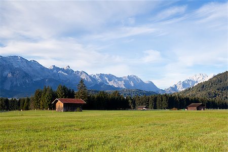 simsearch:400-04806827,k - wooden hut on alpine meadows in morning sunlight Fotografie stock - Microstock e Abbonamento, Codice: 400-06875456