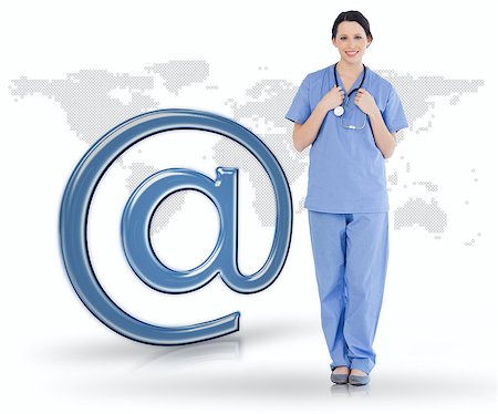 standing nurse in scrubs full length - Nurse in scrubs standing beside at symbol on world map background Stock Photo - Budget Royalty-Free & Subscription, Code: 400-06875528