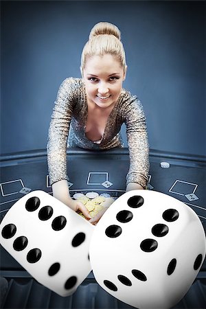 Blonde woman grabbing chips with digital dice in blue tint Stock Photo - Budget Royalty-Free & Subscription, Code: 400-06875671