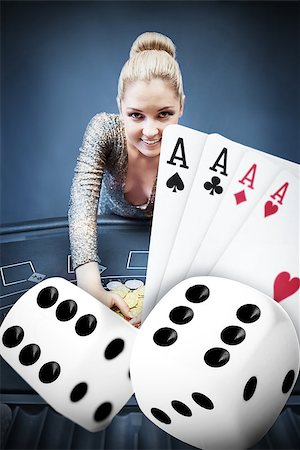 Blonde woman grabbing chips with digital hand of four aces and dice in blue tint at the casino Foto de stock - Super Valor sin royalties y Suscripción, Código: 400-06875673