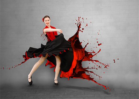 red dress dancing - Flamenco dancer with dress turning into paint splashing on grey wall background Stock Photo - Budget Royalty-Free & Subscription, Code: 400-06875858