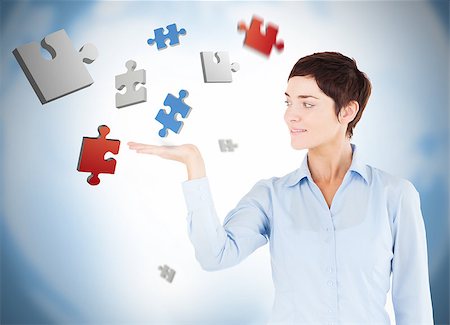 Well dressed woman with digital puzzles levitating Stock Photo - Budget Royalty-Free & Subscription, Code: 400-06876031