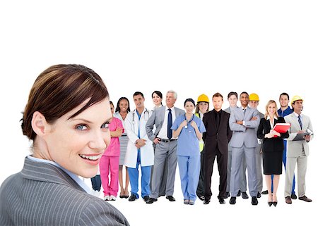 Smiling businesswoman ahead a group of people with different jobs Stock Photo - Budget Royalty-Free & Subscription, Code: 400-06876113