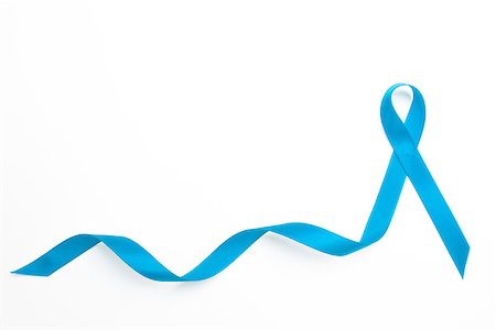 Blue awareness ribbon with trail on white background Stock Photo - Budget Royalty-Free & Subscription, Code: 400-06876137