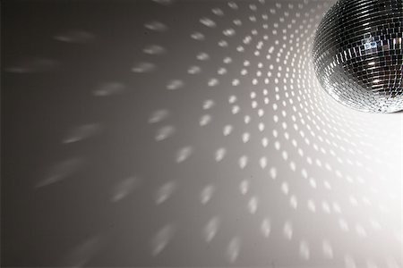 simsearch:6108-05869768,k - Shining disco ball on grey background Foto de stock - Super Valor sin royalties y Suscripción, Código: 400-06876286