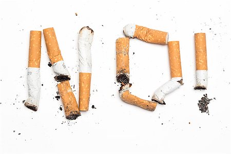 simsearch:400-06876304,k - No with exclamation mark spelled out in cigarette butts on white backround Stockbilder - Microstock & Abonnement, Bildnummer: 400-06876315