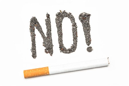 simsearch:400-06876304,k - No with exclamation mark spelled out in ash with a joint with a cigarette on white background Stockbilder - Microstock & Abonnement, Bildnummer: 400-06876321