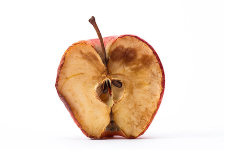 decaying fruit photography - Half a rotten apple on white background Stock Photo - Budget Royalty-Free & Subscription, Code: 400-06876366