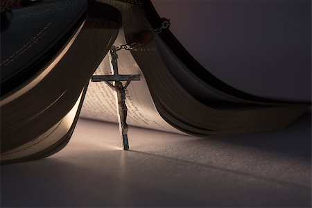 simsearch:400-08017488,k - Crucifix from rosary beads propping open the bible Stock Photo - Budget Royalty-Free & Subscription, Code: 400-06876438