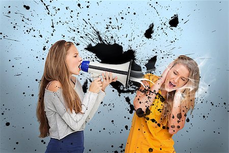 simsearch:400-06876787,k - Girl shouting at another through megaphone on blue background with black paint splashes Foto de stock - Super Valor sin royalties y Suscripción, Código: 400-06876741