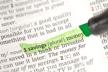 financial highlights - Savings money definition highlighted in green in the dictionary Stock Photo - Budget Royalty-Free & Subscription, Code: 400-06877003