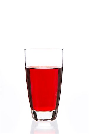 simsearch:400-06877048,k - Glass filled with red liquid on white background Foto de stock - Royalty-Free Super Valor e Assinatura, Número: 400-06877046