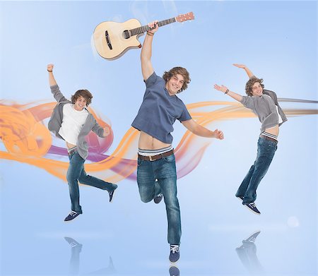smoking teen boys - Three of the same young man jumping for joy one holding a guitar with orange and purple smoke trail on blue background Stock Photo - Budget Royalty-Free & Subscription, Code: 400-06877090