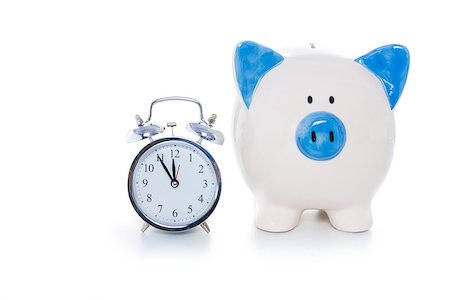 piggy bank hand - Hand painted blue and white piggy bank beside alarm clock on white background Stock Photo - Budget Royalty-Free & Subscription, Code: 400-06877168