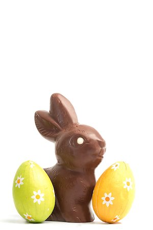 foil chocolate bunnies - Chocolate bunny with two easter eggs on white background Stock Photo - Budget Royalty-Free & Subscription, Code: 400-06877444