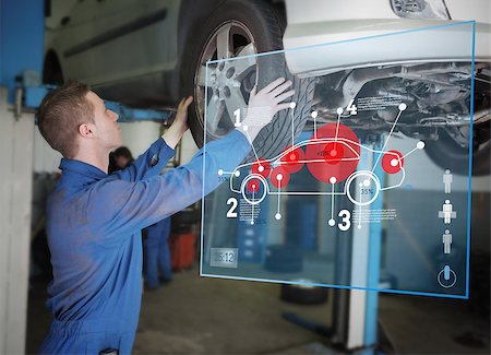 posición de rueda - Mechanic checking wheel of a car helped by futuristic interface Foto de stock - Super Valor sin royalties y Suscripción, Código: 400-06877603