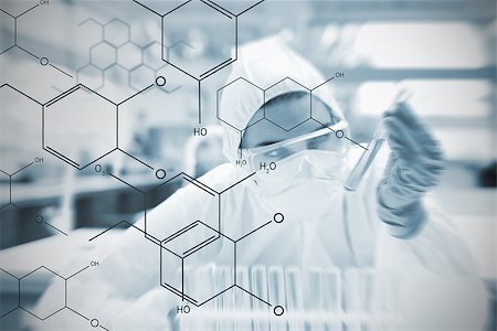 formule chimique - Chemist working cautiously with liquid and futuristic interface showing formula in soft focus effect Photographie de stock - Aubaine LD & Abonnement, Code: 400-06877714