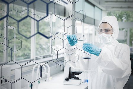 picture for futuristic biotechnology - Chemist in protective suit working with futuristic interface with formula diagram on it Stock Photo - Budget Royalty-Free & Subscription, Code: 400-06877717