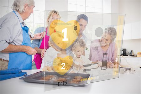 futuristic boy kid - Extended family baking together with futuristic interface in the kitchen Stock Photo - Budget Royalty-Free & Subscription, Code: 400-06877759