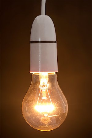 simsearch:400-06878422,k - Close up of dazzling light bulb on vertical picture Stock Photo - Budget Royalty-Free & Subscription, Code: 400-06878125