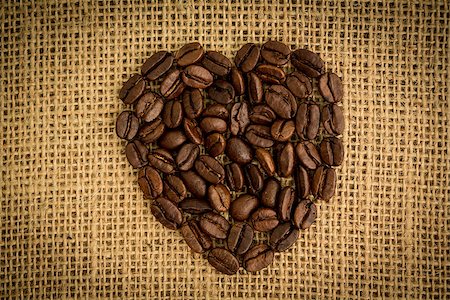 Heart made of coffee beans on burlap sack Stock Photo - Budget Royalty-Free & Subscription, Code: 400-06878365