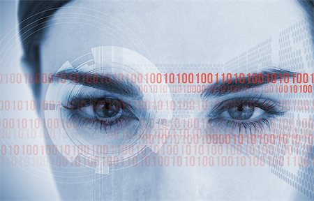 Portrait of an attractive woman with binary code looking at the camera Stock Photo - Budget Royalty-Free & Subscription, Code: 400-06878384