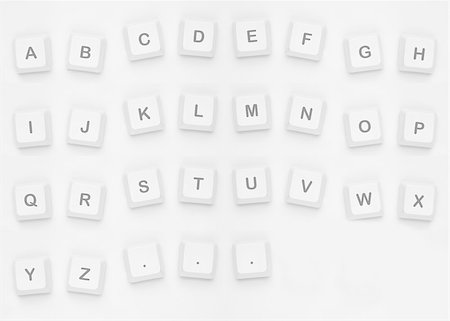 Letters spelling out alphabet onto white background Stock Photo - Budget Royalty-Free & Subscription, Code: 400-06878502