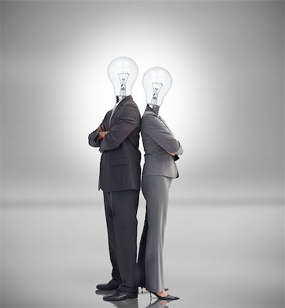 Business people with light bulbs instead of heads standing back to back Stock Photo - Budget Royalty-Free & Subscription, Code: 400-06878690