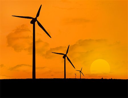 simsearch:400-07220226,k - Four wind turbines with a sunset Stockbilder - Microstock & Abonnement, Bildnummer: 400-06878724