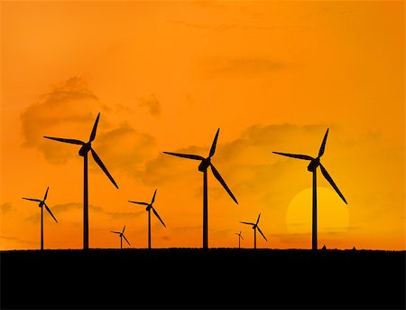 simsearch:400-07220226,k - Several wind turbines with a sunset in line Stockbilder - Microstock & Abonnement, Bildnummer: 400-06878725