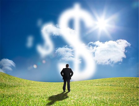 Businessman looking at cloud dollar signs in the sky Stock Photo - Budget Royalty-Free & Subscription, Code: 400-06878759