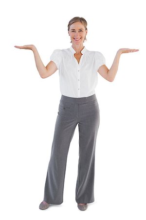 simsearch:400-06883455,k - Smiling businesswoman presenting something with her two hands raised on white background Photographie de stock - Aubaine LD & Abonnement, Code: 400-06878964