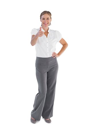 simsearch:400-06883455,k - Smiling businesswoman showing her thumb up on white background Photographie de stock - Aubaine LD & Abonnement, Code: 400-06878968