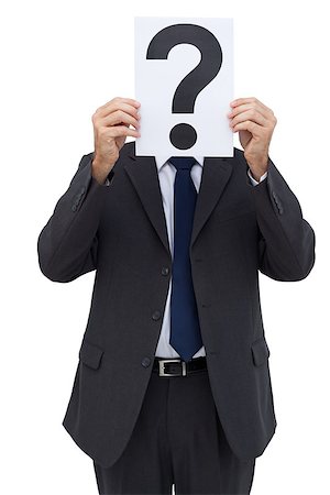 question mark - Businessman holding a question mark paper in front of his face on white background Stock Photo - Budget Royalty-Free & Subscription, Code: 400-06879021