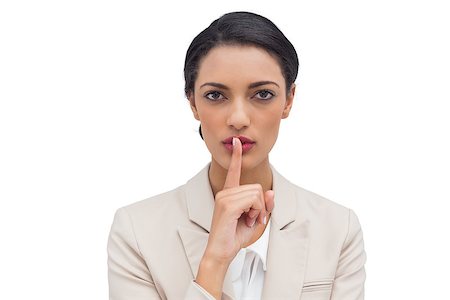 simsearch:400-06883455,k - Businesswoman asking for silence on white background Photographie de stock - Aubaine LD & Abonnement, Code: 400-06879096