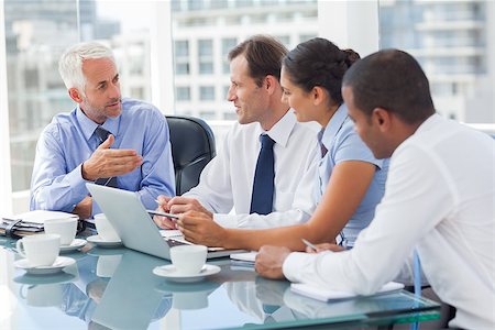 simsearch:400-06879270,k - Group of business people brainstorming together in the meeting room Stock Photo - Budget Royalty-Free & Subscription, Code: 400-06879346