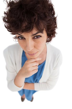 Overhead of thoughtful woman with hand touching her chin on white background Stock Photo - Budget Royalty-Free & Subscription, Code: 400-06879672