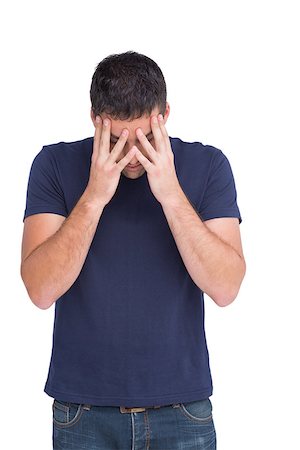 desperate - Upset man standing with his head in hands on white background Stock Photo - Budget Royalty-Free & Subscription, Code: 400-06879991