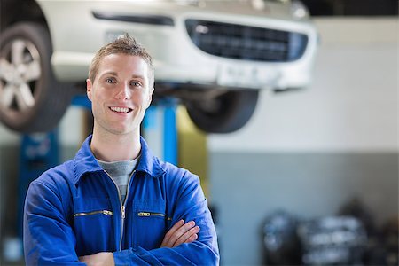 Portrait of confident male mechanic in workshop Stock Photo - Budget Royalty-Free & Subscription, Code: 400-06870088