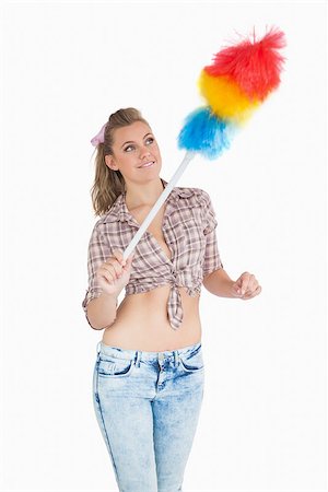 simsearch:614-07806116,k - Casual young woman using colorful feather duster over white background Stockbilder - Microstock & Abonnement, Bildnummer: 400-06870606