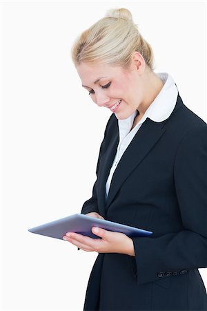 simsearch:400-06802290,k - Young business woman using digital tablet over white background Stock Photo - Budget Royalty-Free & Subscription, Code: 400-06871023