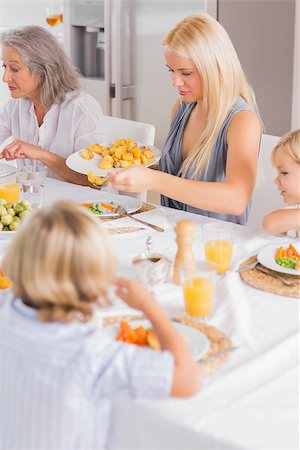 simsearch:400-06871551,k - Woman serving vegetables herself for thanksgiving Stock Photo - Budget Royalty-Free & Subscription, Code: 400-06871620