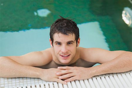Handsome man looking up from the swimming pool Stock Photo - Budget Royalty-Free & Subscription, Code: 400-06871686