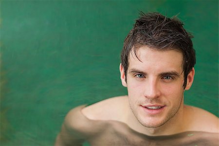 Handsome man in the swimming pool looking up Stock Photo - Budget Royalty-Free & Subscription, Code: 400-06871688