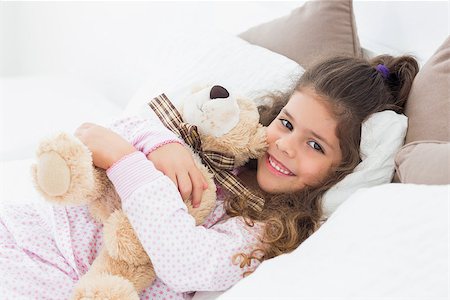 small little girl pic to hug a teddy - Little girl and her teddy bear on bed Stock Photo - Budget Royalty-Free & Subscription, Code: 400-06872837