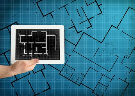 reproduction in architecture - Tablet displaying blueprint on blue digital background Stock Photo - Budget Royalty-Free & Subscription, Code: 400-06873480