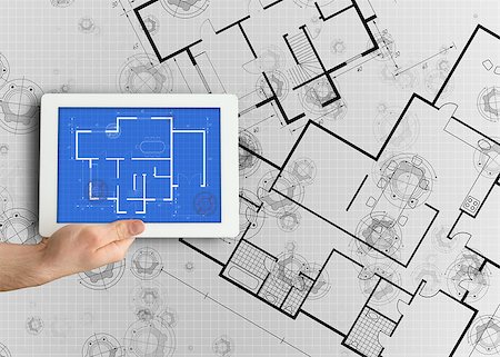 reproduction in architecture - Digital tablet displaying blueprint on white background Stock Photo - Budget Royalty-Free & Subscription, Code: 400-06873527