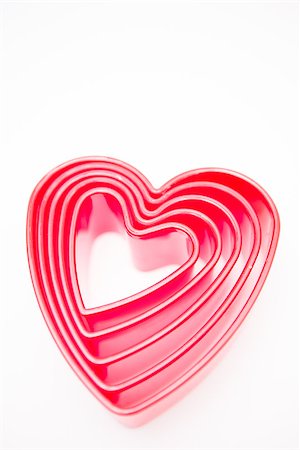 simsearch:400-06873734,k - Pink heart shaped cookie cutters Stock Photo - Budget Royalty-Free & Subscription, Code: 400-06873683