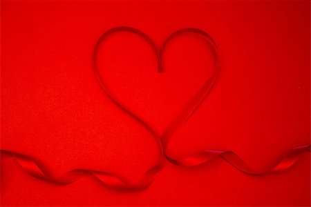 simsearch:400-06873734,k - Heart shaped ribbon in red Stock Photo - Budget Royalty-Free & Subscription, Code: 400-06873723