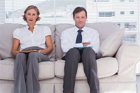 Serious business people sitting in a waiting room Stock Photo - Budget Royalty-Free & Subscription, Code: 400-06884727